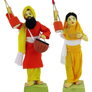indian artisan hand making clay indian singer couple  dolls